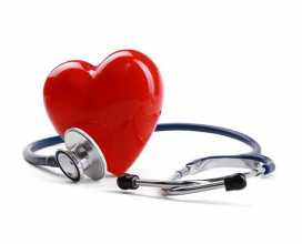 Estetoscópio e coração a ilustrar a doença coronária